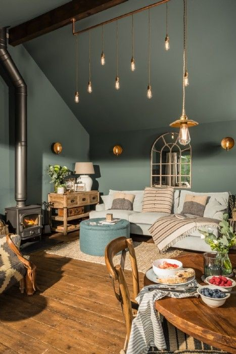 Creating a living room with a sage green aesthetic may feel like a daunting task. You want to keep it warm and inviting, yet also sophisticated and bold.