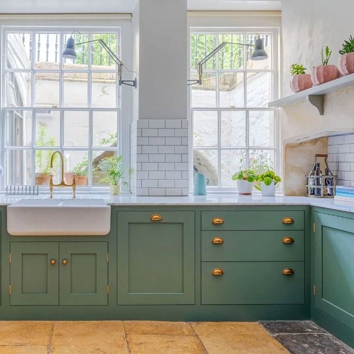 Adding a timely sage green aesthetic to your kitchen is an excellent way to instantly update the look of your cabinets.